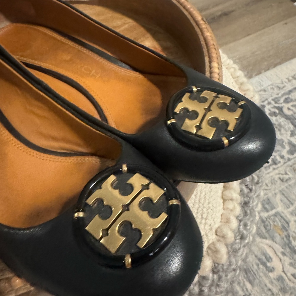 Tory Burch Black Flats with Gold Emblem - Picture 2 of 5